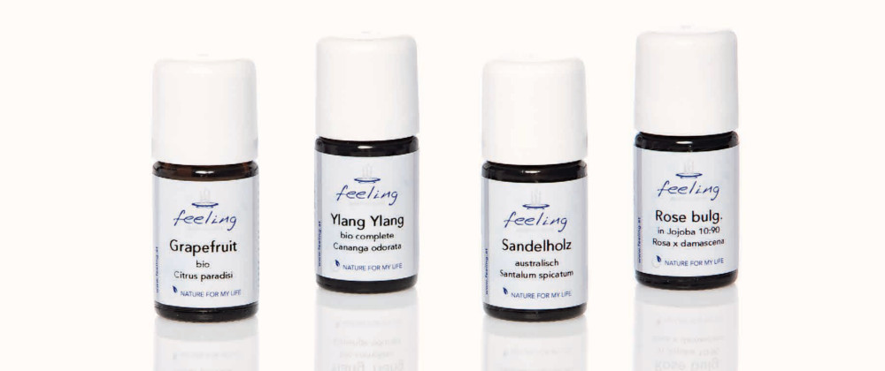 Vier Fläschchen ätherischer Öle von feeling